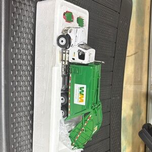 Green and White WM Toy Truck